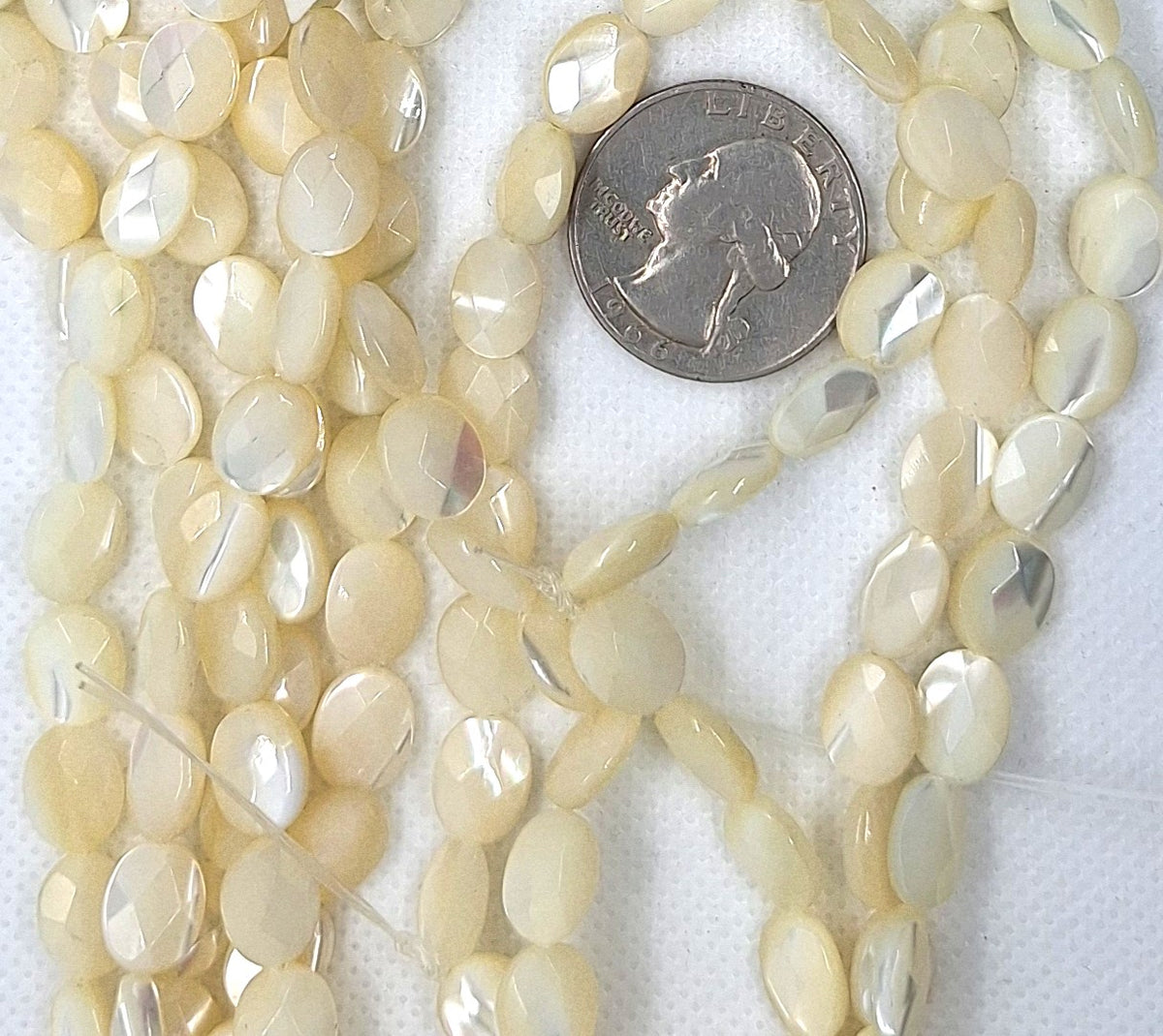 10x8mm Mother of Pearl MOP Faceted Oval Shell Beads 16-Inch Strand