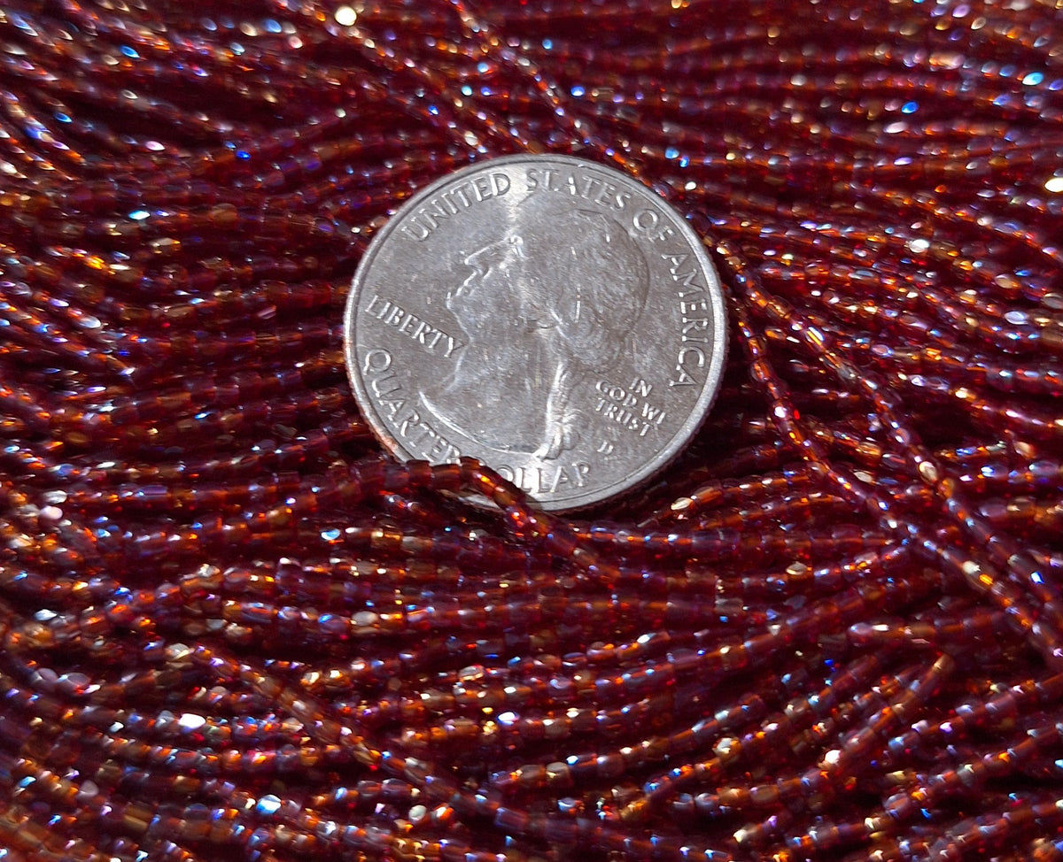 12/0 Ruby Transparent Iris 3-Cut Czech Seed Beads Full Hank