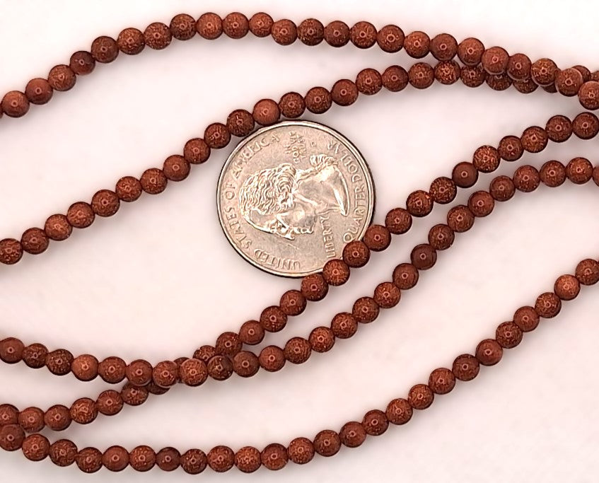 4mm Goldstone Round Gemstone Beads 8-Inch Strand