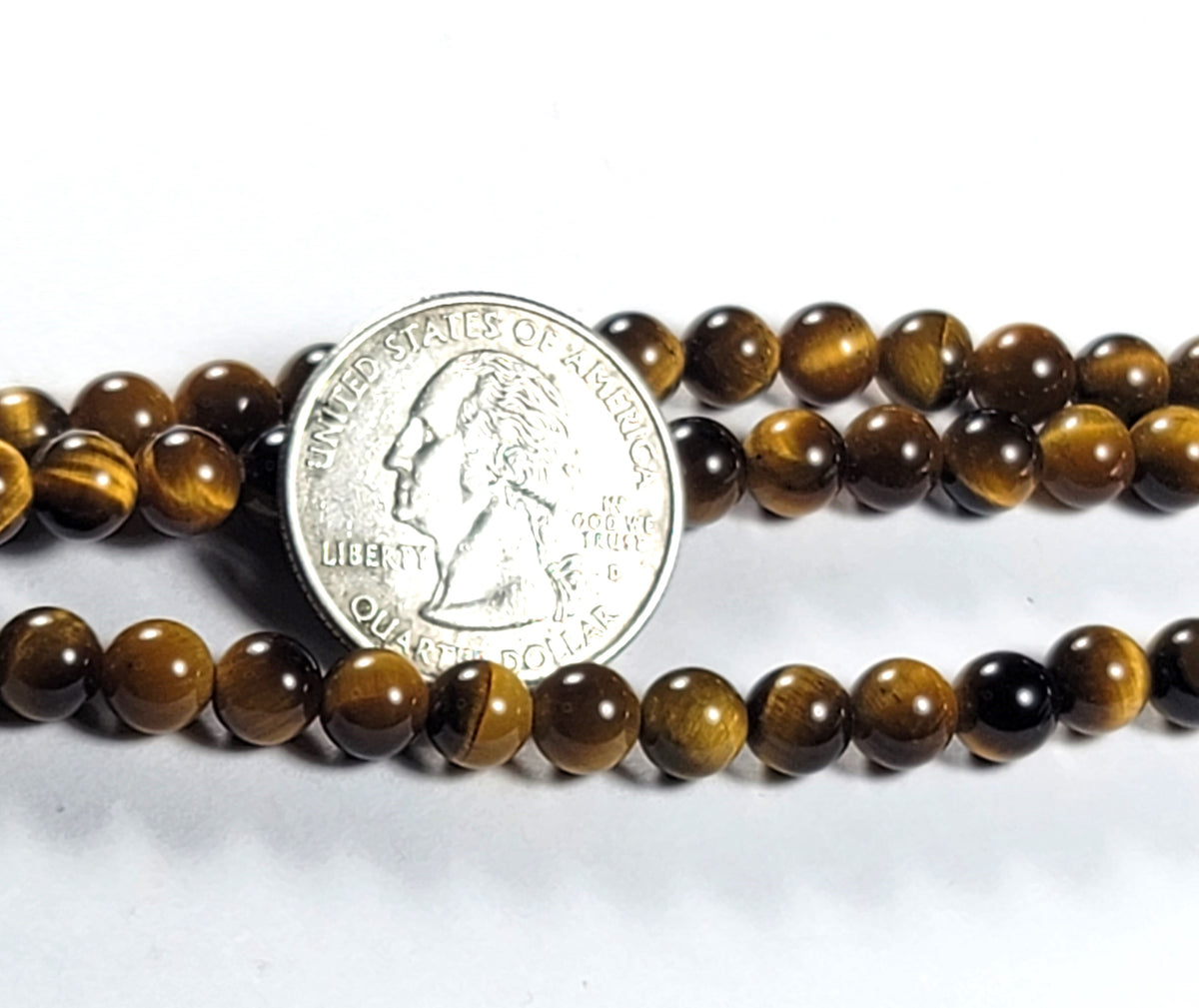 6mm Tiger's Eye Round Gemstone Beads 8-Inch Strand