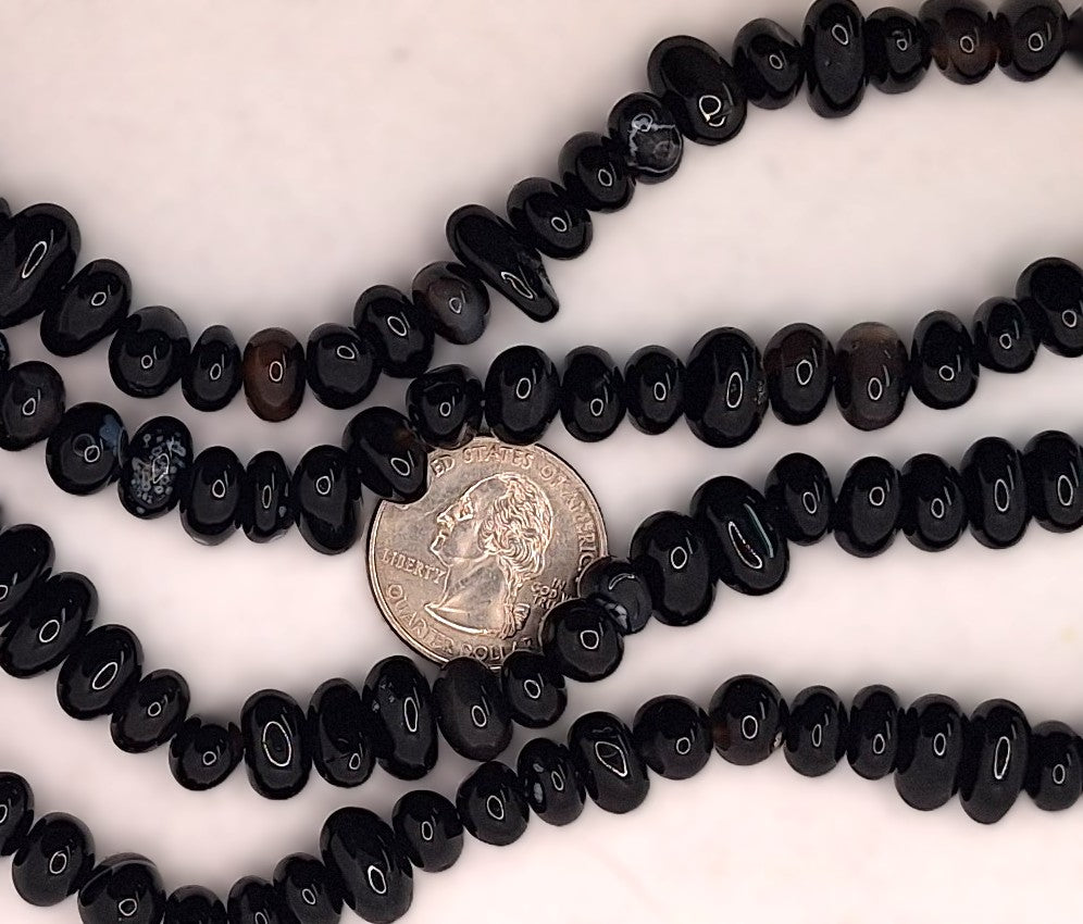 12x8mm Black Onyx Center-Drilled Pebble Gemstone Beads 8-inch Strand