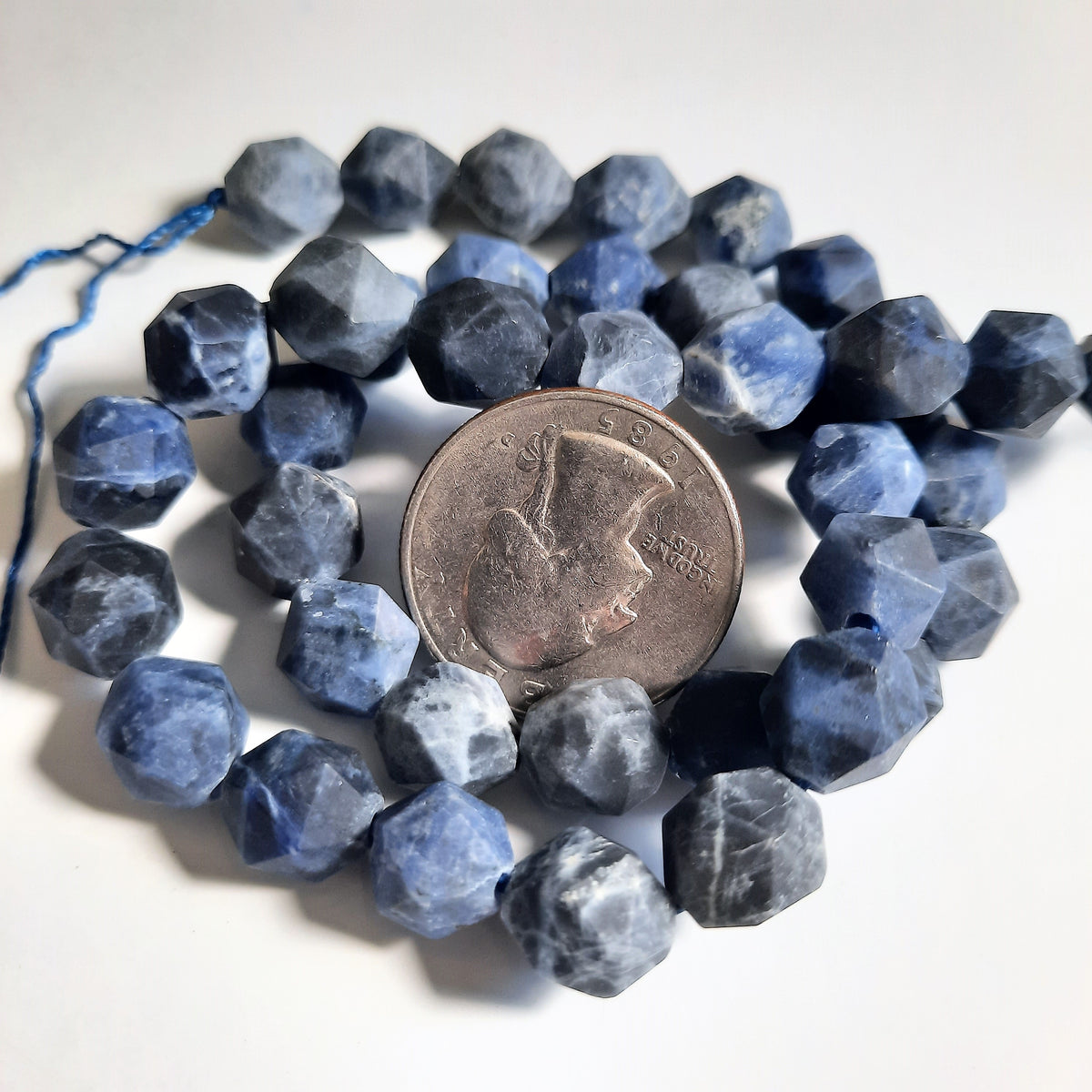 Matte Sodalite 10mm Star Cut Round Dakota Stones 8-inch Strand